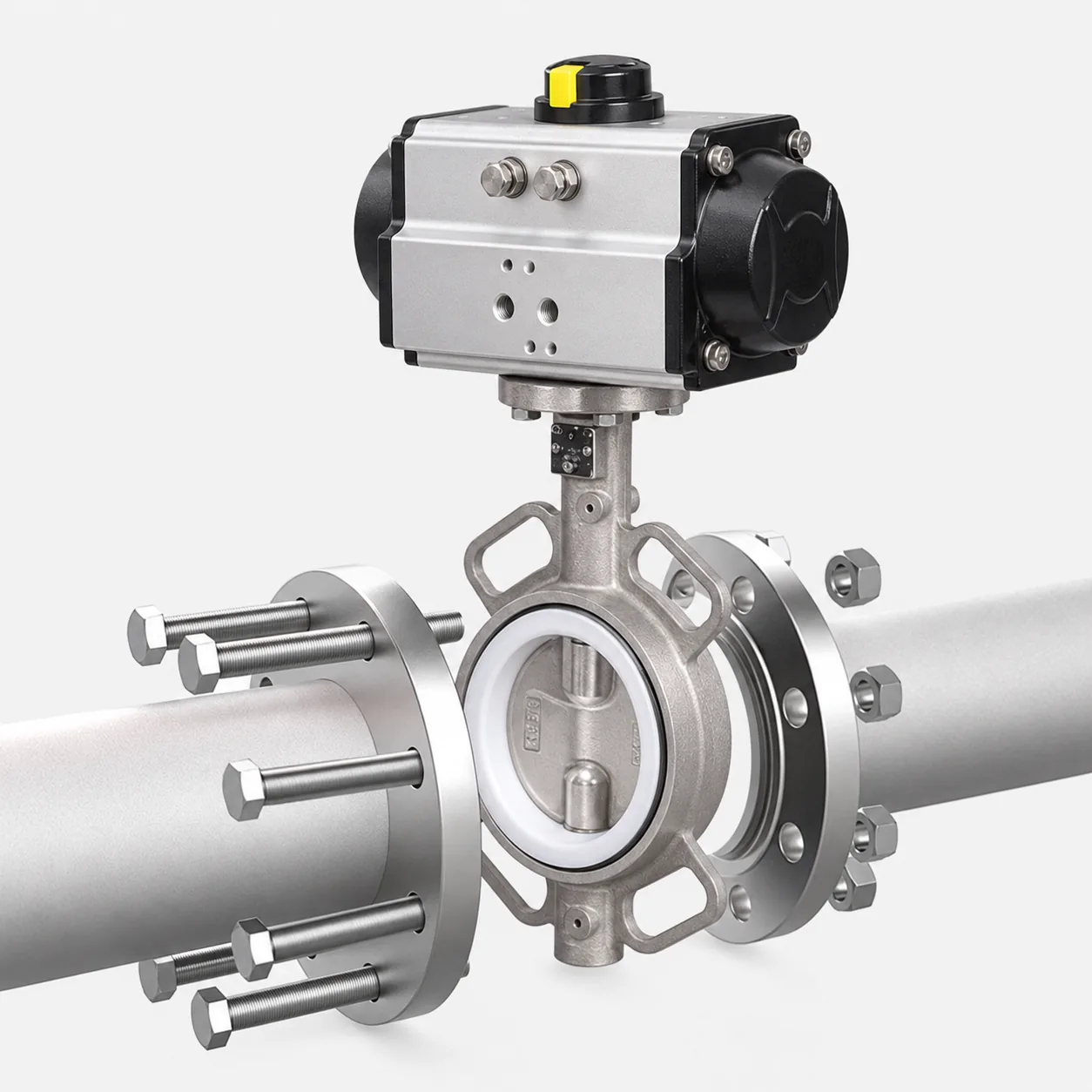 Pneumatic rack-and-pinion actuator mounted on a stainless butterfly valve's top flange through a machined bracket and a splined shaft coupling
