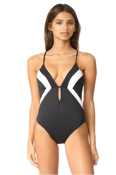 a graphic one-piece with strategically placed lines