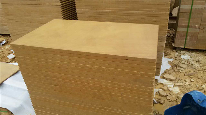 yellow buff paving slabs
