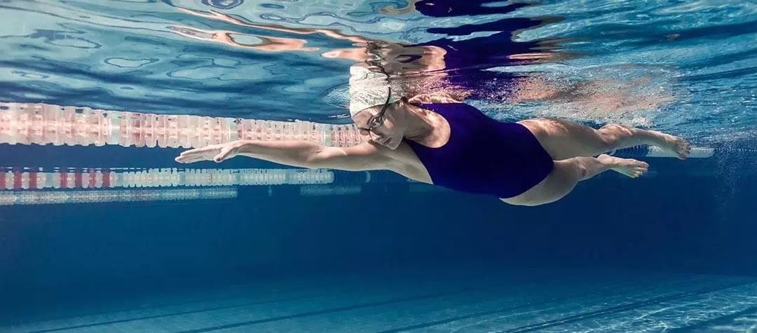 Swimmer in the Swimming Pool Water