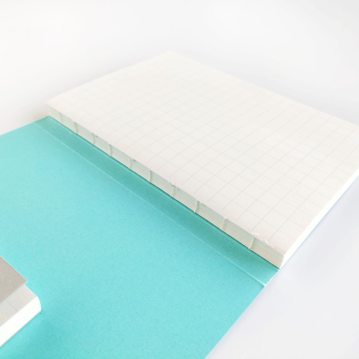 Custom Hard Cover Binding One Hundred Sheet Notepads