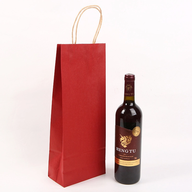 red paper bags with twisted handles