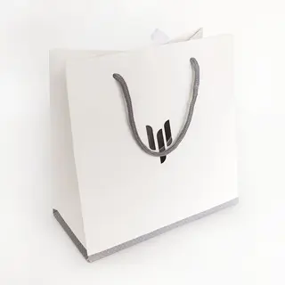white gift bags with rope handles