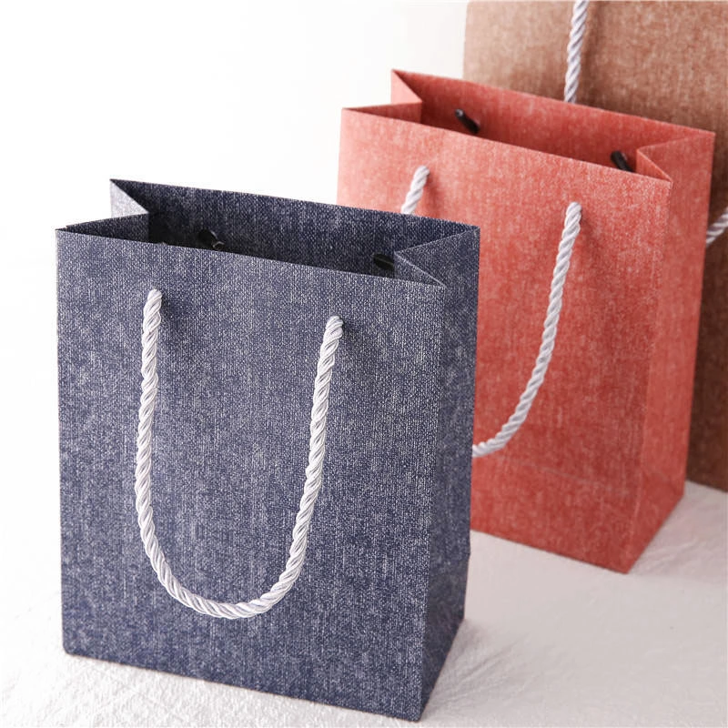 Paper bags with rope handles