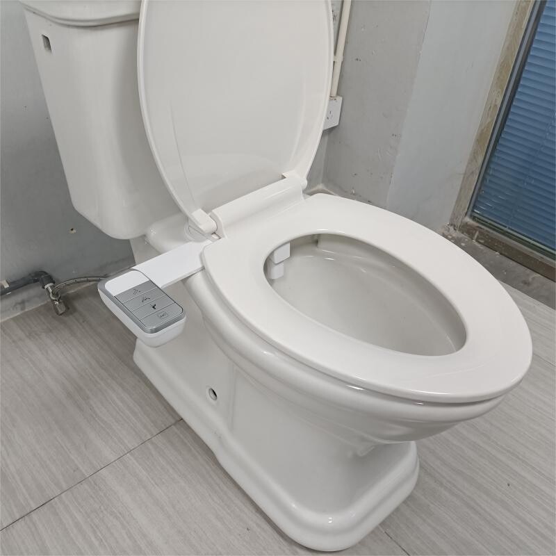 Bidet attachment adjustable nozzle