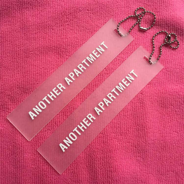 Embossed Logo Transparent PVC Rubber Hangtag With Metal Ballchain