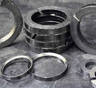 Die-Formed Graphite Packing Rings