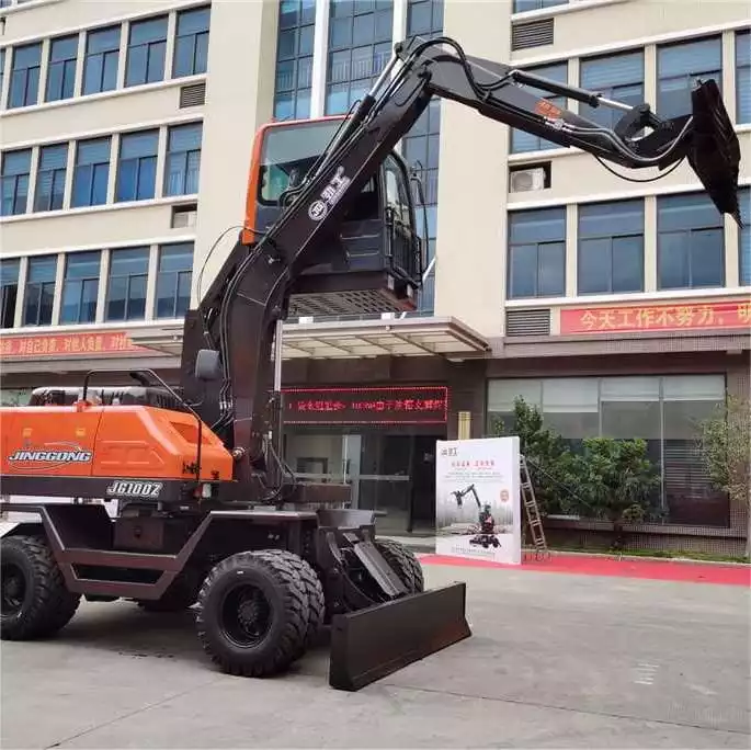Wheeled Excavator with Material Leveler and Coal Sweeper