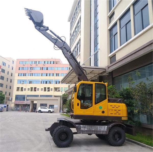 Tyre Excavator with a Gear Pump and a Piston Pump