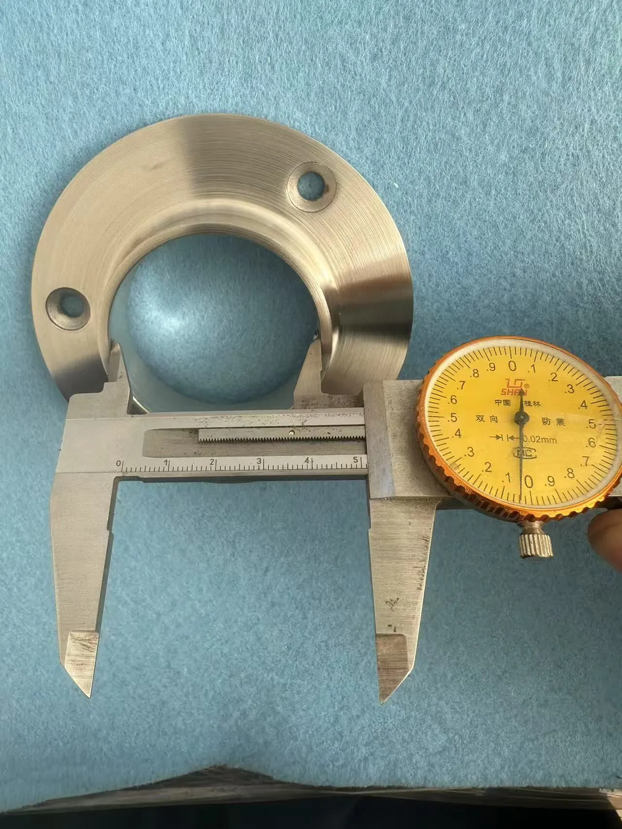 Caliper showing inner diameter of stainless steel base flange for Ø50.8mm post