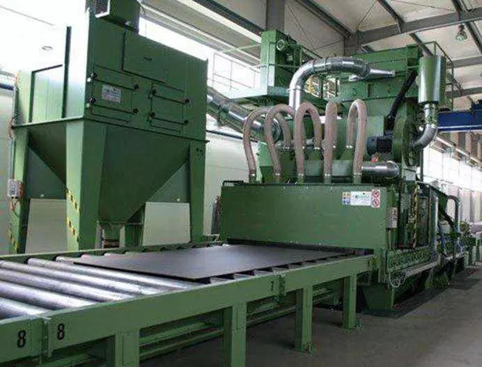 The role of roller conveyor shot blasting machine in metal