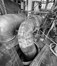 Root Cause Analysis of Microstructural Abnormalities and Low Hardness in a P91 Elbow