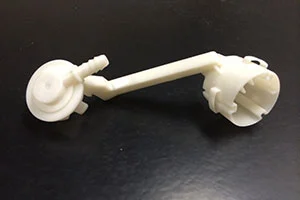 What is the cooling time required within the injection mold?