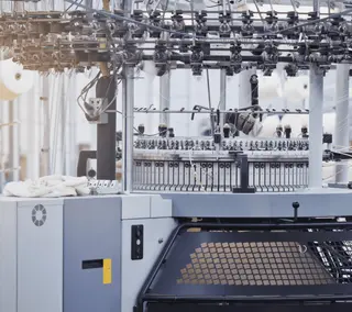 What is an Open Width Knitting Machine?