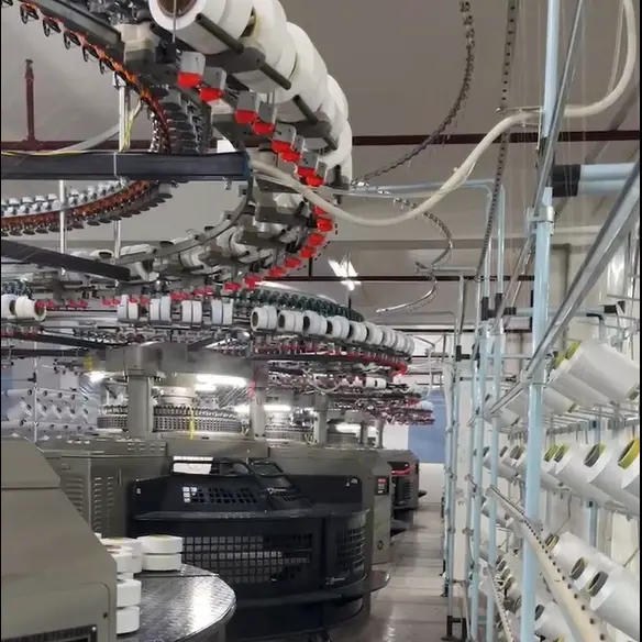 Double Jersey Open-width Knitting Machines in Operation