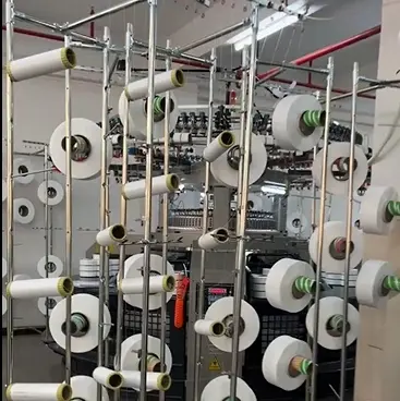 Machine à tricoter circulaire à largeur ouverte à double jersey à calibre fine