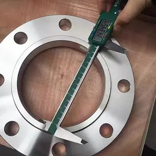 Flange assembly, gasket materials and fasteners